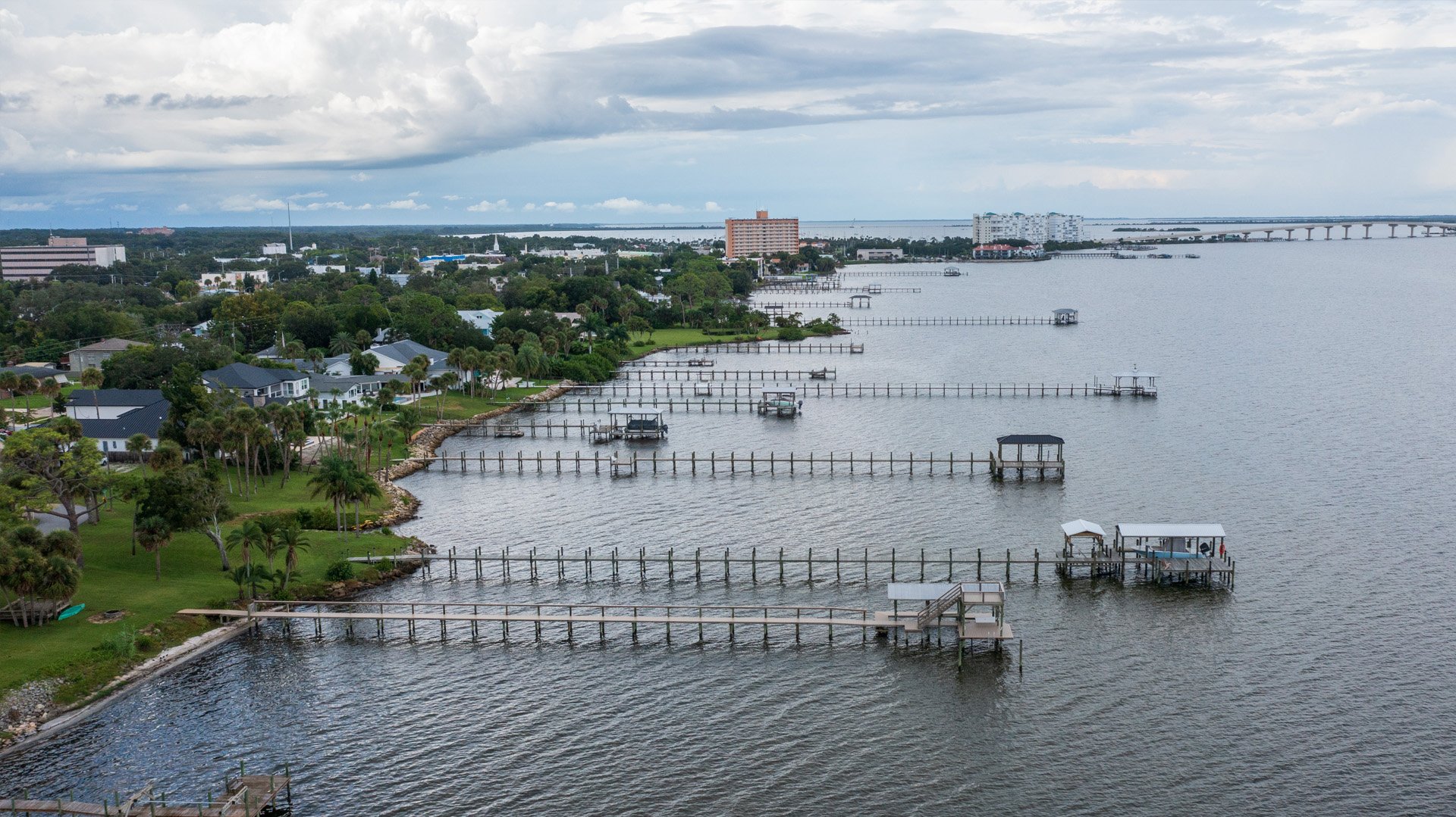 A drone image shows homes along the Indian River Lagoon in
                            Titusville.